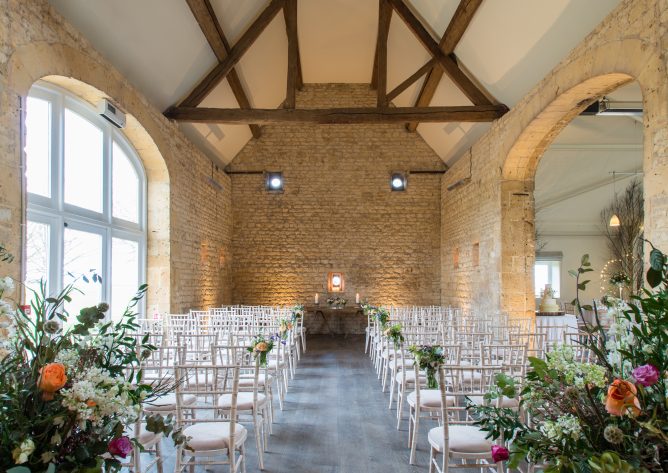 The 18th century Stone Barn is an idyllic setting for your Cotswold barn wedding with its exposed stone walls and soaring rafters