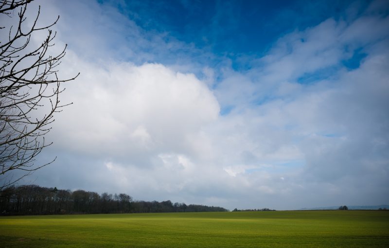 View from Lapstone Barn of open countryside and stunning sky