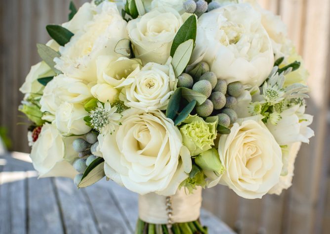 Hand tied bridal bouquet in whites and soft neutrals