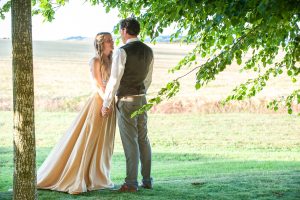 Bride and groom photographed outside this beautiful Cotswold wedding venue. Photography: Rachel Jones Photography