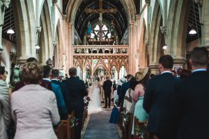 Bride and groom standing at the altar during the wedding ceremony