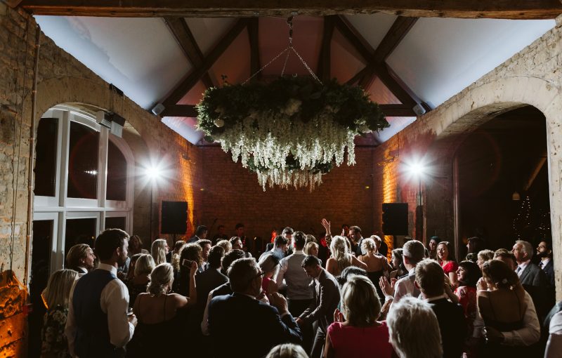 The dancefloor packed with wedding guests for the first dance. Image: David Hughes Photography