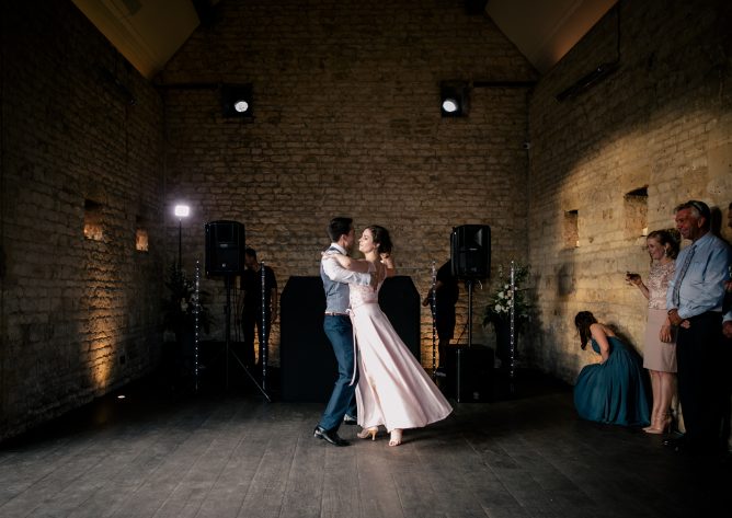 Bride and groom dancing together for their first dance. Photography: Katie Hamilton Photography