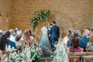 Bride and groom exchanging vows during their wedding ceremony