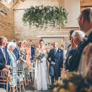 Bride walking down the aisle with her father