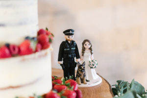 Bride and groom wedding cake topper